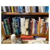 Bottom Shelf of Books as Seen in Photo.