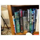 Bottom Shelf of Books as Seen in Photo.