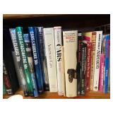 Bottom Shelf of Books as Seen in Photo.