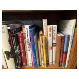 Bottom Shelf of Books as Seen in Photo.