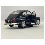 Four Model Cars and Wooden Train. Mercedes-Benz 300SL, Volvo PV 544, 1934 Duesenberg, 1937 Cord 812.
