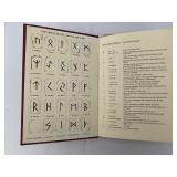 The Book of Runes and a Set of Rune Tiles.
