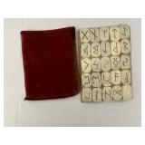 The Book of Runes and a Set of Rune Tiles.