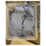 Bin of New and Used Pajama Tops and Bottoms.