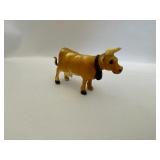 Porcelain Bulldogs and Cows, Toy Car, Norwegian Flag, and Countryside Print.