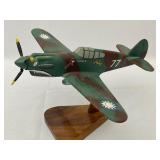 Two P40 Flying Tiger Model Planes of Different Scales.
