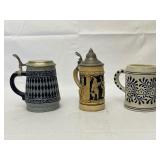 Three Beer Steins as Seen in Pictures.