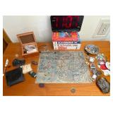 Books on Travel to Europe and Variety of Trinkets, Leather Wallets, and Necklaces for Men.