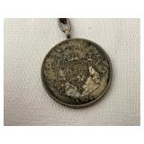 Books on Travel to Europe and Variety of Trinkets, Leather Wallets, and Necklaces for Men.