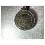 Books on Travel to Europe and Variety of Trinkets, Leather Wallets, and Necklaces for Men.