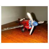 Vintage cast iron P 40 Warhawk fighter plane measuring 10 inches long by 10 inches wide