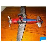 Vintage cast iron P 40 Warhawk fighter plane measuring 10 inches long by 10 inches wide
