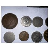Various vintage coins as seen in photo