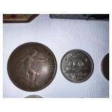 Various vintage coins as seen in photo
