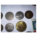 Various vintage coins as seen in photo