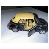 Three vintage cars, one Avon 1951 Studebaker aftershave bottle and VW convertible