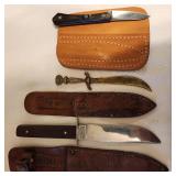 Three Antique Knives with Leather Sheaths