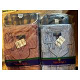 Four Pajama Tops and Bottoms. Brand New in Package. Size: Large.