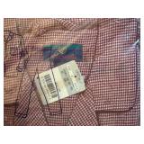 Four Pajama Tops and Bottoms. Brand New in Package. Size: Large.