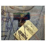 Four Pajama Tops and Bottoms. Brand New in Package. Size: Large.