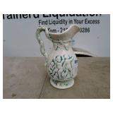 Vintage Embossed Ceramic Pitcher with Cherub Design