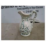 Vintage Embossed Ceramic Pitcher with Cherub Design