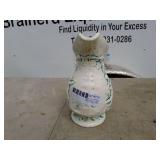 Vintage Embossed Ceramic Pitcher with Cherub Design