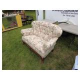 Vintage Floral Upholstered Loveseat with Carved Wood Accents