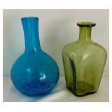 Variety of Colorful Glass Bottles and Vases
