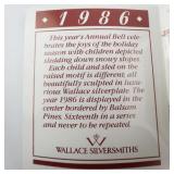 Wallace Silversmiths  1986 "Coasting Children" silver plate Christmas Sleigh Bell Ornament . Limited Edition. 16th in a series.