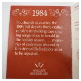 Wallace Silversmiths  1984 "Rejoicing Carolers" silver plate Christmas Sleigh Bell Ornament . Annual Edition. 14th in a Series