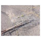 3 Tomato Cages and 2 Pitchforks
