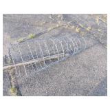 3 Tomato Cages and 2 Pitchforks