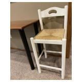 Table and White Stool with Thatched Seat