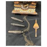 Vintage Cuckoo Clock with Pendulum, Glassware, and Decorative Metal Pitcher