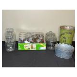 Collection of Assorted Glass Jars and Metal Containers