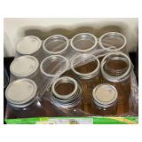 Collection of Assorted Glass Jars and Metal Containers
