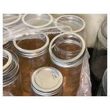 Collection of Assorted Glass Jars and Metal Containers