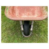 Green Metal Wheelbarrow with Single Pneumatic Tire