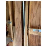 Assorted Wood Planks and Metal Pole