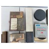 Assorted Sharpening Stones, Honing Oil, and Clamps