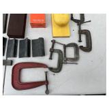 Assorted Sharpening Stones, Honing Oil, and Clamps
