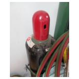 Miller Thunderbolt AC/DC welder along with related accessories.