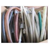 Assorted Plastic and Rubber Hoses with Hose Cutter