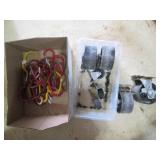 Lot of Red Scaffold Clamps, Hooks, and Caster Wheels