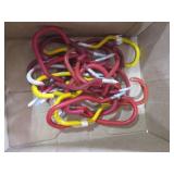 Lot of Red Scaffold Clamps, Hooks, and Caster Wheels