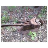 Antique Wagon Wheel and Vintage Metal Tool