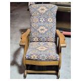 Antique Oak Platform Rocking Chair with Upholstered Seat and Decorative Pattern