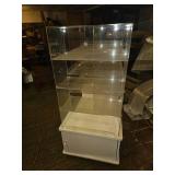 Acrylic Display with Many Cubbies and Cabinet Below Display Cabinet