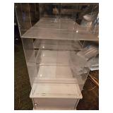 Acrylic Display with Many Cubbies and Cabinet Below Display Cabinet